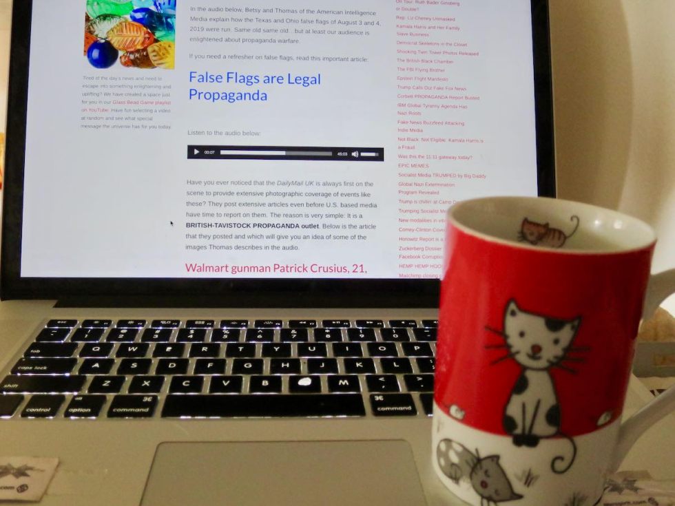 ulrich reads site with kitty.jpg