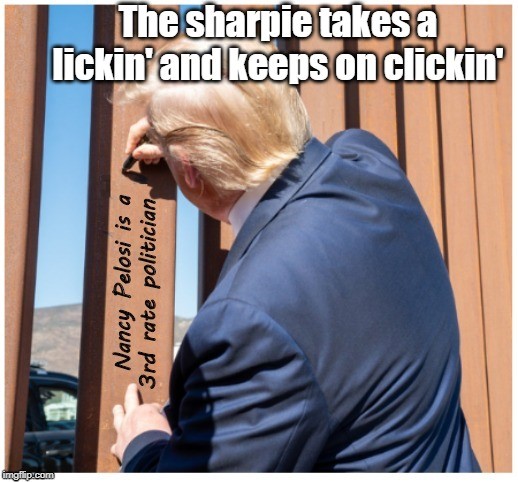 trump wall pelosi.jpg