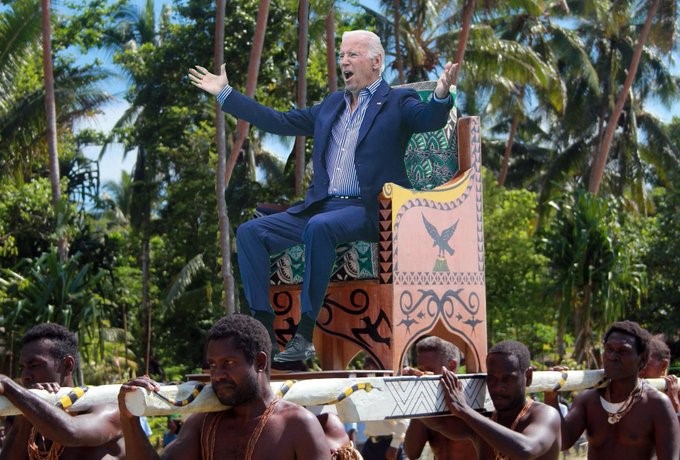 biden riding on chair