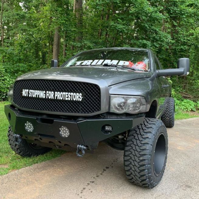 trump protestors truck