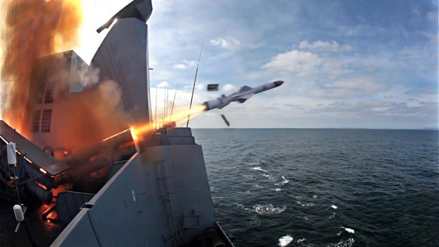 A picture containing sky, outdoor, weapon, missile Description automatically generated
