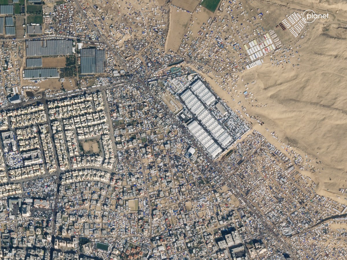 This satellite image provided by Planet Labs PBC shows the southern Gaza town of Rafah on Jan. 14, 2024. The town is normally home to 280,000 people. But its population has swelled to over 1.5 million – roughly three quarters of Gaza's population -- as people flee fighting elsewhere in Gaza. Sprawling tent camps now dot the city. (Planet Labs PBC via AP)