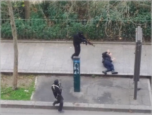 Islamic terrorists prepare to execute a wounded policeman after their attack on the offices of French magazine Charlie Hebdo on Jan. 7, 2015.