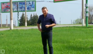 Correspondent Michael Usher of Australia’s “60 Minutes” claims to have found the billboard visible in a video of a BUK missile launcher after the shoot-down of Malaysia Airlines Flight 17 on July 17, 2014. (Screen shot from Australia’s “60 Minutes”)