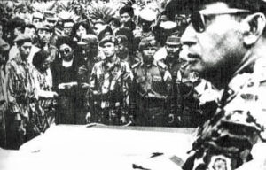 General Suharto attending the funerals of murdered Indonesian generals in October 1965.