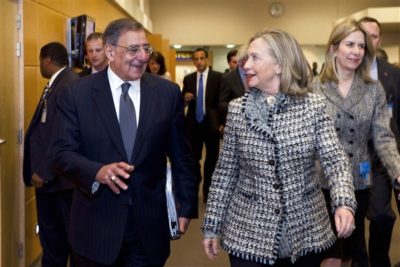 Defense Secretary Leon E. Panetta talks with Secretary of State Hillary Rodham Clinton at NATO Headquarters in Brussels, April 18, 2012. DOD photo by Erin A. Kirk-Cuomo