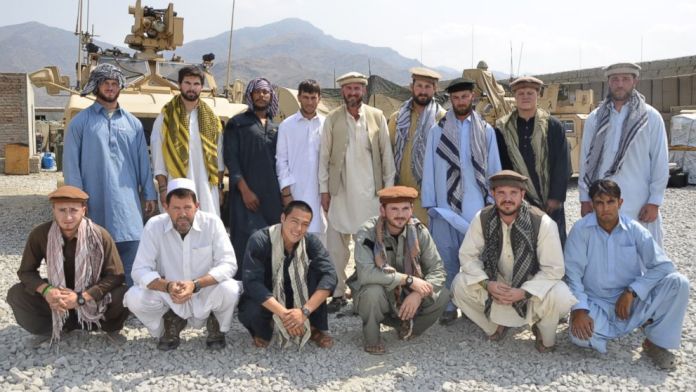 PHOTO: Former Special Forces Maj. Jim Gant, center, insisted that his troops dress like locals in eastern Afghanistan to better win their trust.