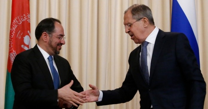 Russian Foreign Minister Sergei Lavrov and his Afghan counterpart Salahuddin Rabbani shake hands after their meeting in Moscow, Russia, February 7, 2017