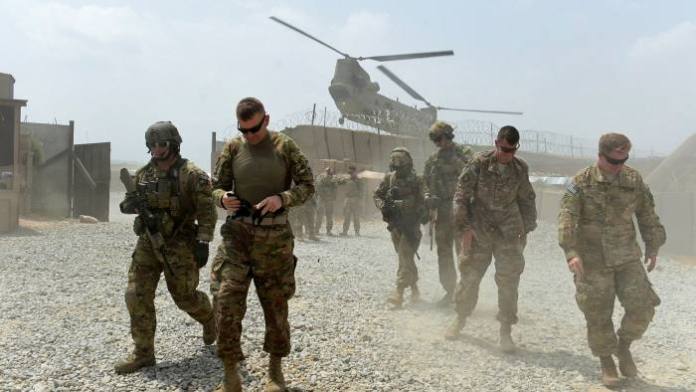 US soldiers at an army base in Afghanistan. Donald Trump’s announcement that all US troops in the country would return home by Christmas surprised the Pentagon